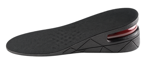 Stature Air Lift height increase insole in side profile, showing the layered heel wedge and red air-cushion capsule